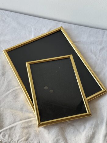 Set of 2 medium size vintage metal frames with glas